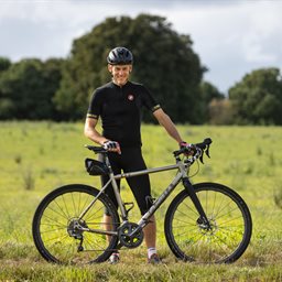 Man posing with a bike