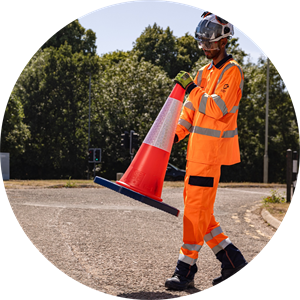 Highways engineer putting out cones
