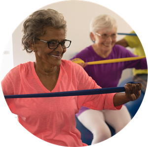 Older lady exercising with a resistance band