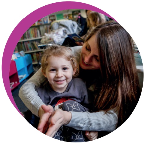 Mum and child in a library