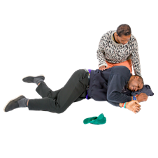 A woman leaning over a collapsed man
