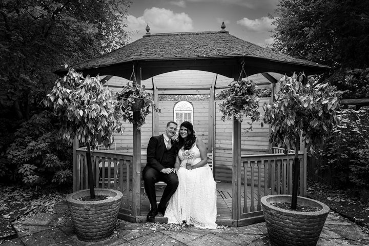 Bride and groom in a pagoda