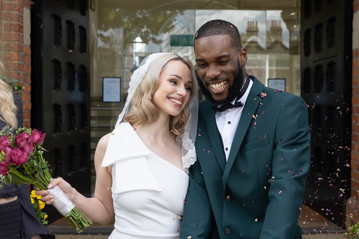 Bride and groom leaving St Albans Register Office