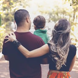 Man, woman and baby on a walk