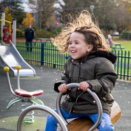 Girl on a seesaw