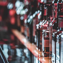 Bottles of spirits behind a bar