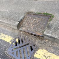 Drain sunken in pavement