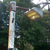 Sign Light Lens Damaged or Dirty