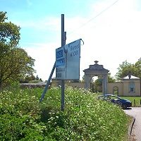 Unlit sign damaged