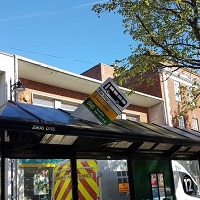 bus stop sign damaged