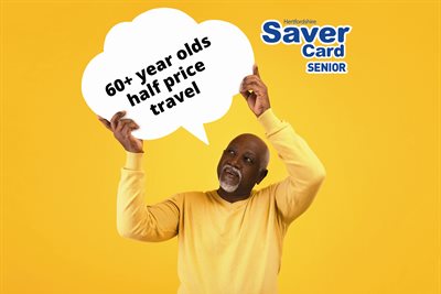 Man holding a sign saying "60+ year olds half price travel"