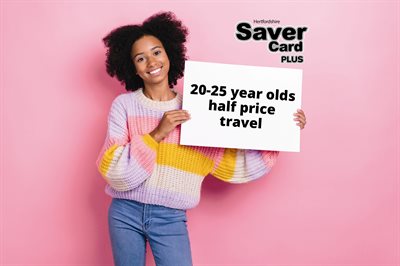 Woman holding a sign saying "20-25 year olds half price travel"