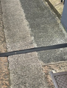 A cross-pavement charging channel