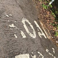 Faded road marking