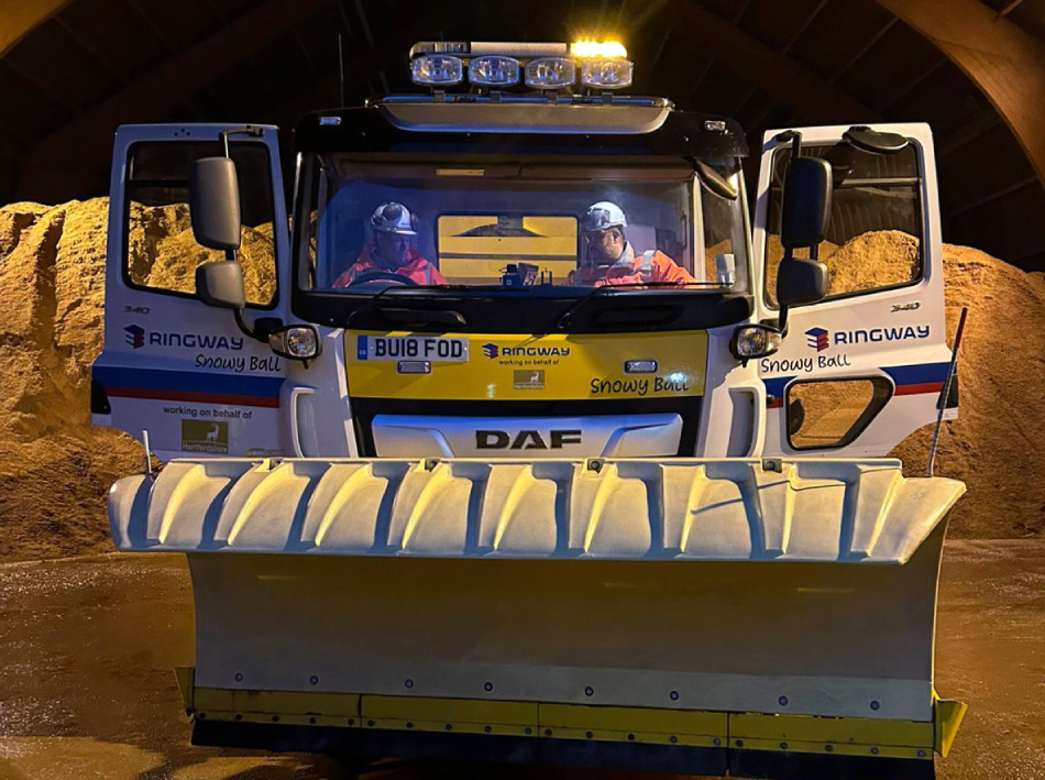 Snowy Ball gritter truck with plough