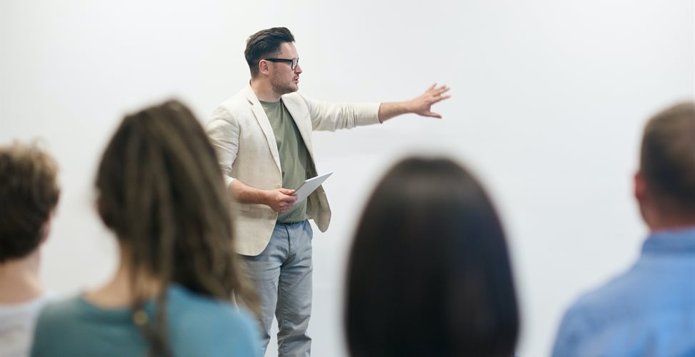 Man giving a speech to an audience