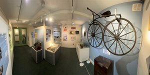 An exhibit at Hertford Museum including an old bicycle