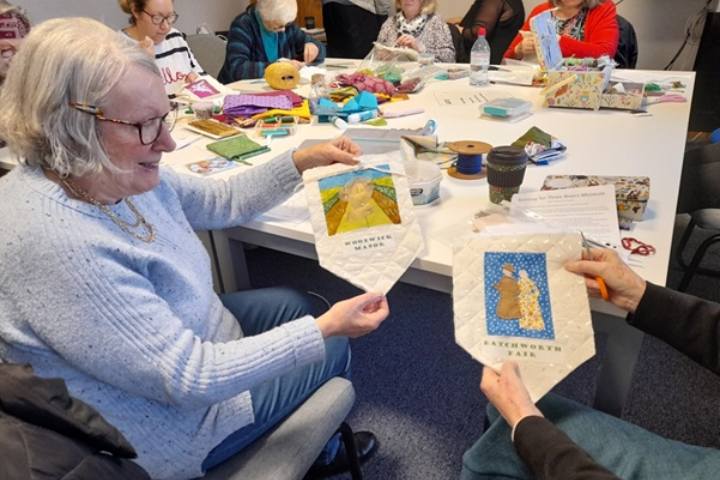 Needleworkers Stitches in Time