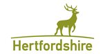 Green stag over the word Hertfordshire