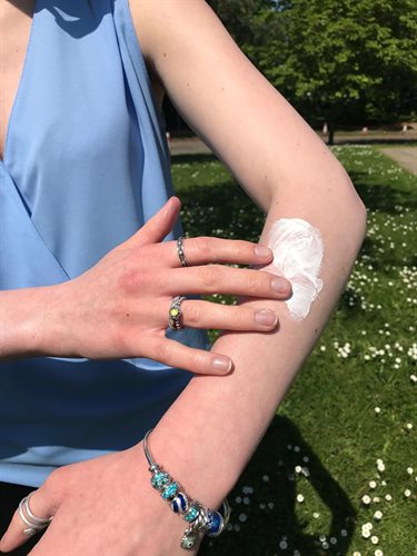 Applying suncream