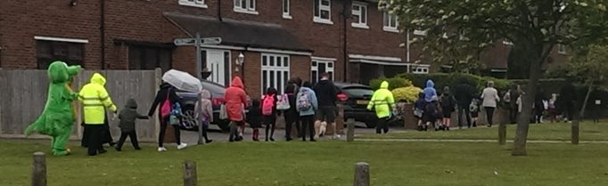 Buster plus lots of people walking