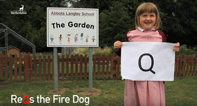 Q - kid holding letter