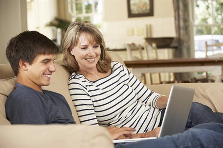 bigstock-Mother-With-Teenage-Son-Sittin-92339939