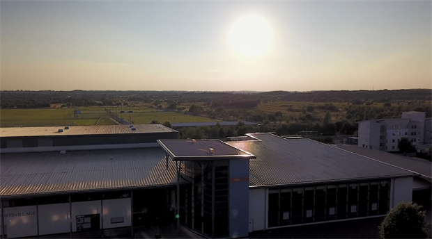 Sunny horizon above some buildings