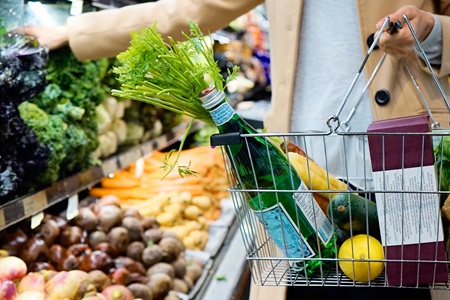 A woman with a shopping basket