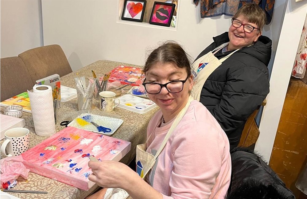 2 women painting and crafting
