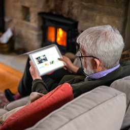 Older man using a tablet