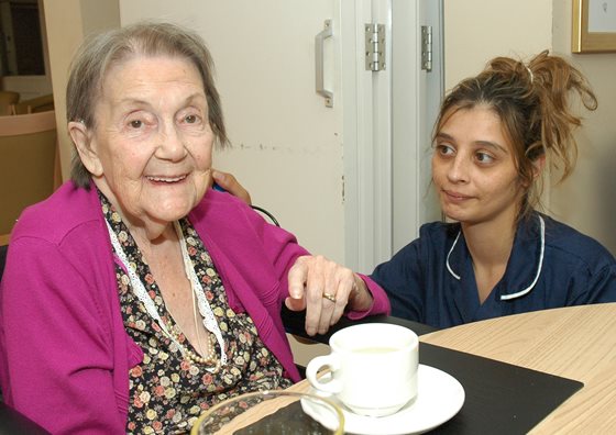 Carer-at-dinner-560x396