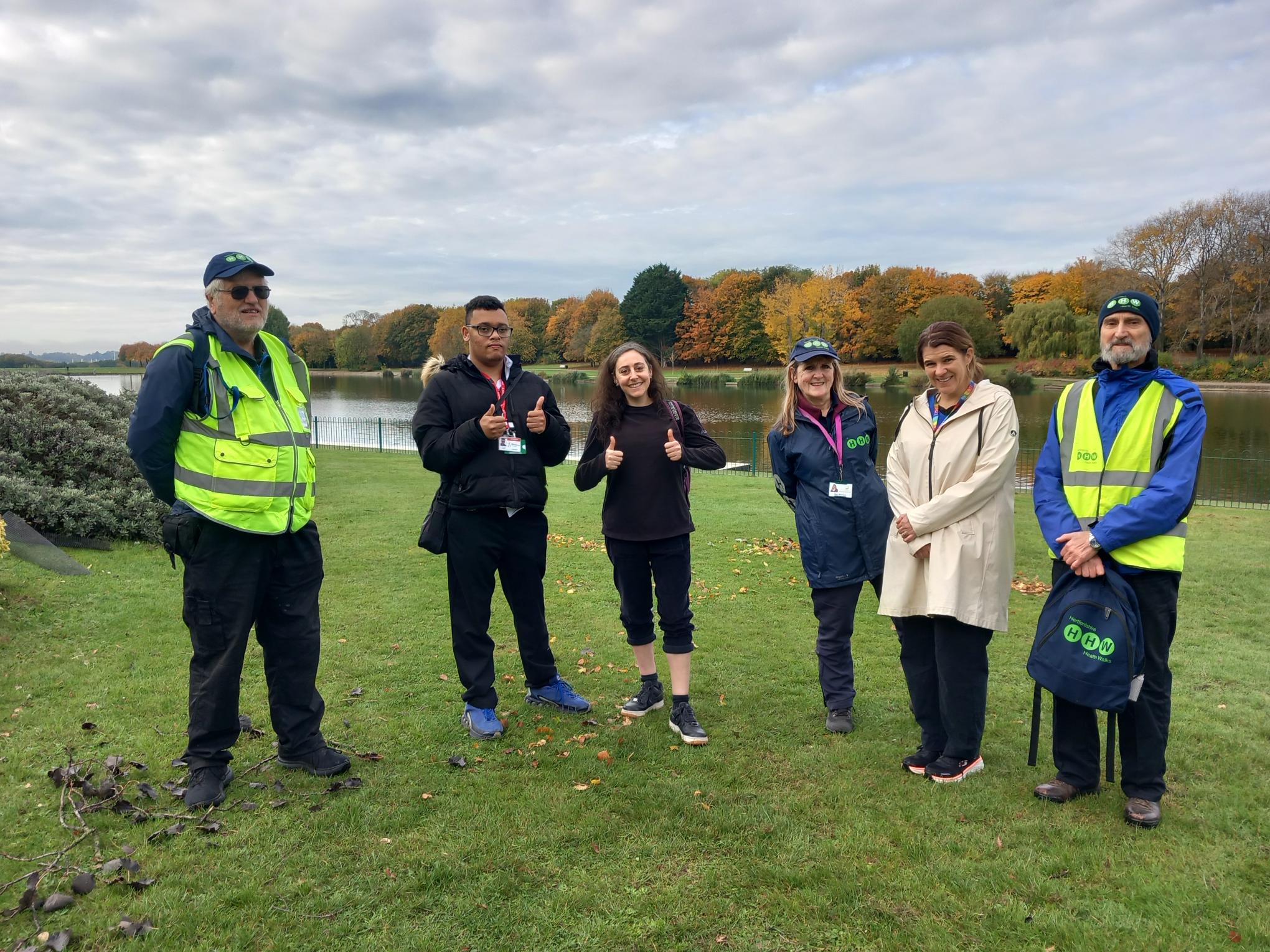 A group of walkers smiling after a health walk