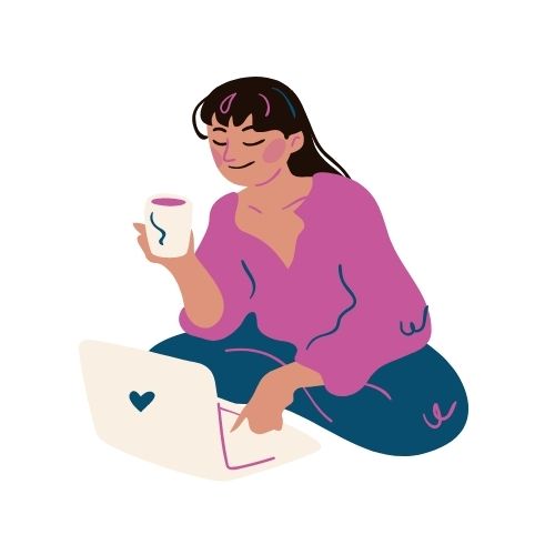 Lady sitting cross legged, drinking coffee and using laptop