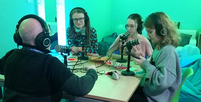SEND Youth Council doing a recording activity with microphones.