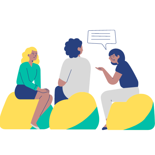 Image of 3 people sitting on beanbags and chatting