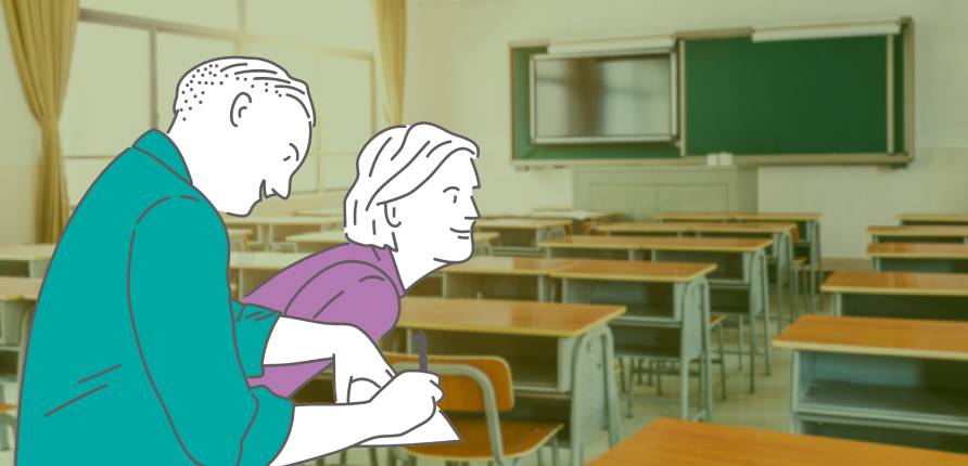 Couple sitting in a classroom